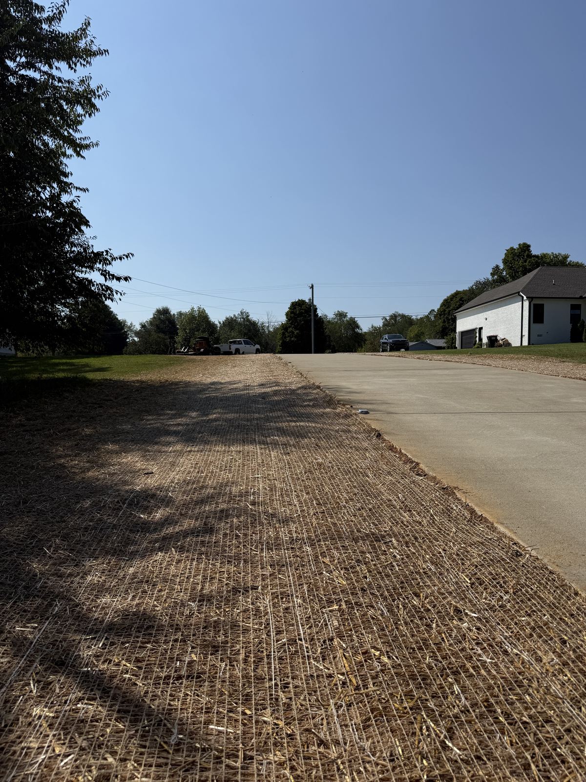 Topsoiled and matted driveway shoulder leading up to the house &mdash; Greenbrier TN