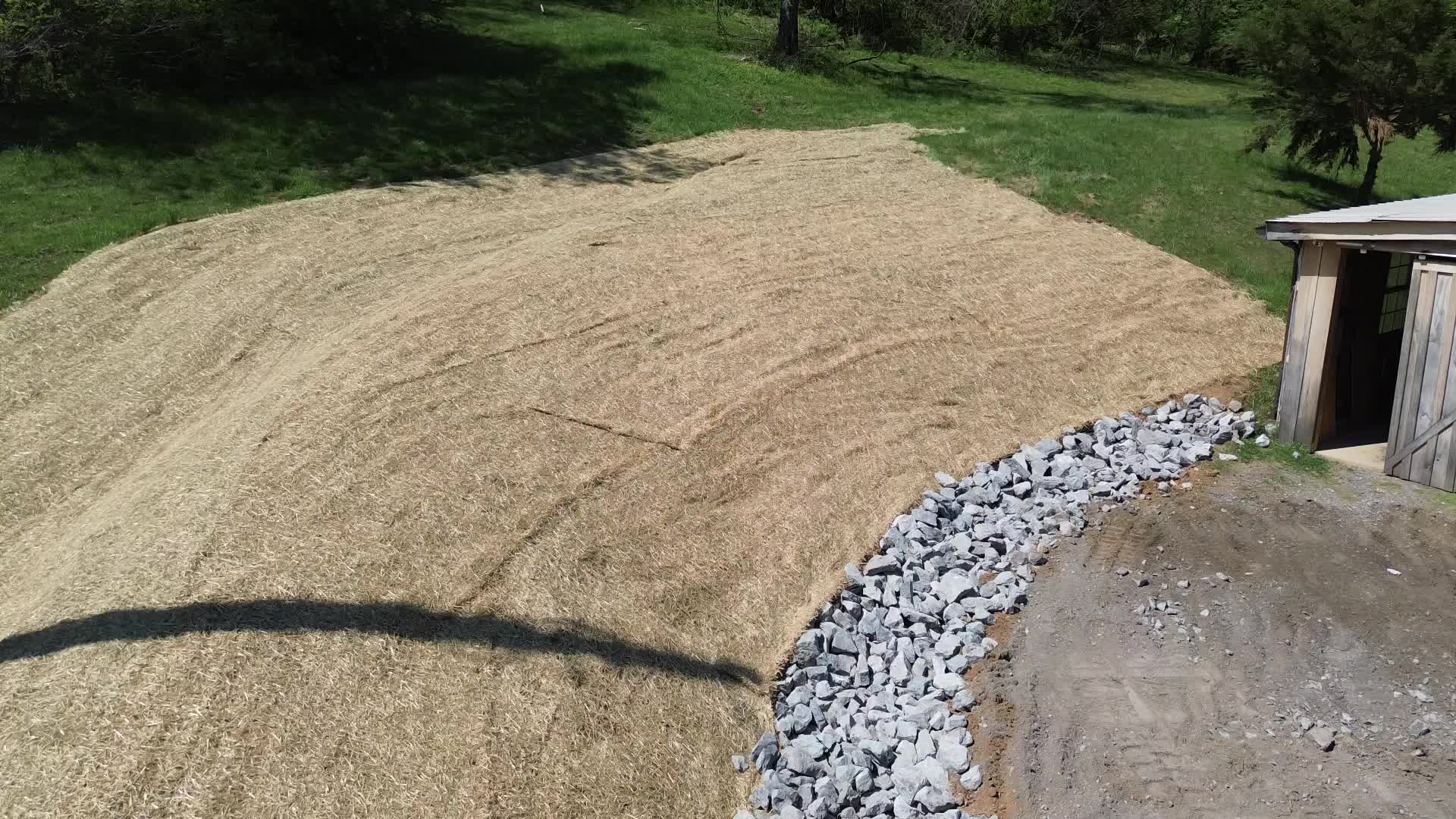 Aerial — straw matting and riprap erosion control after grading