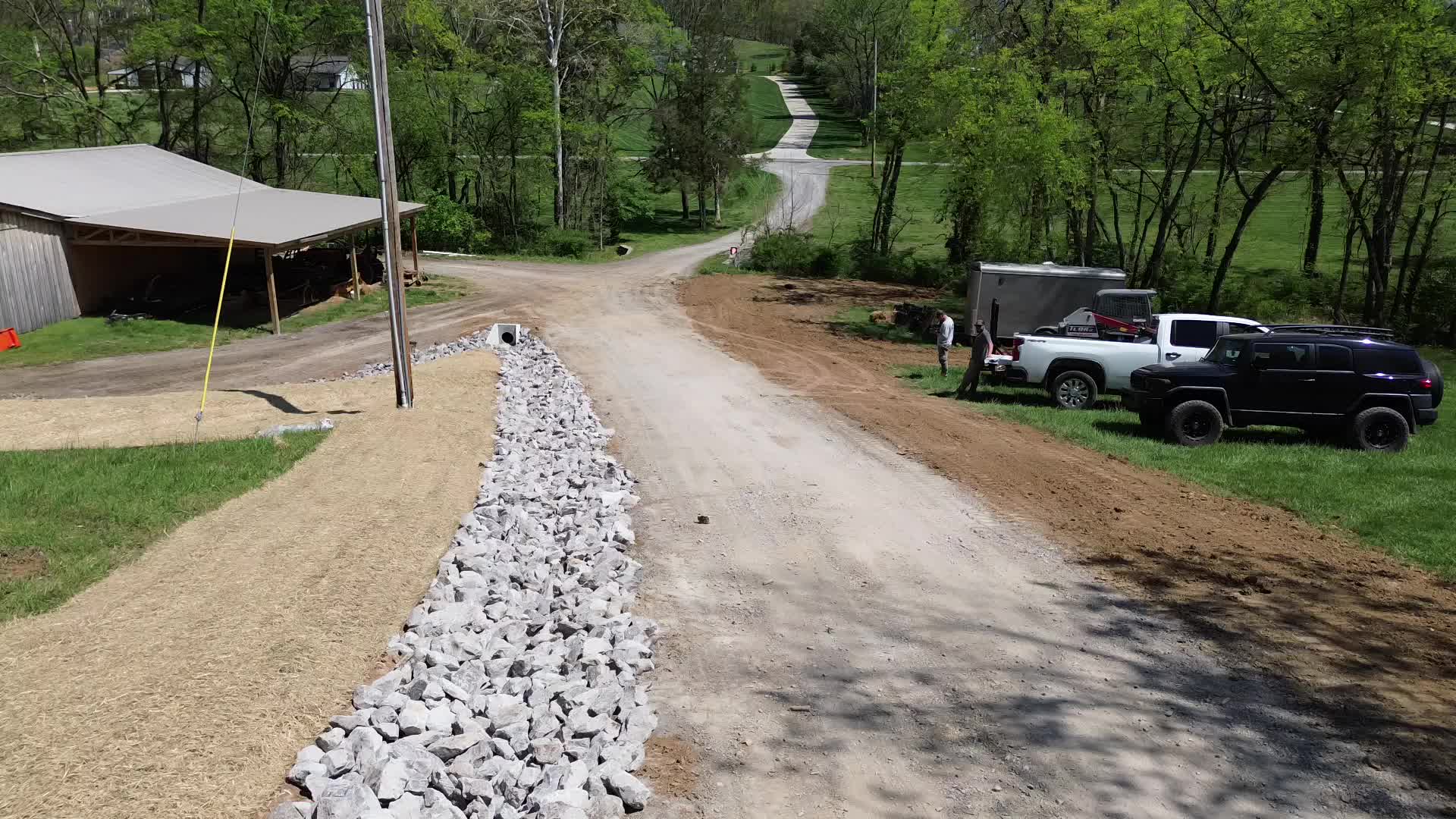 Aerial — completed driveway with riprap drainage swale, Hendersonville TN