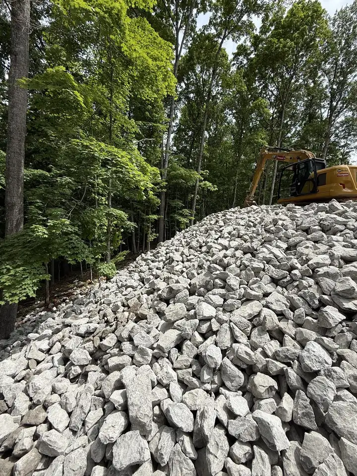 Riprap bank stabilization with CAT excavator, Tennessee