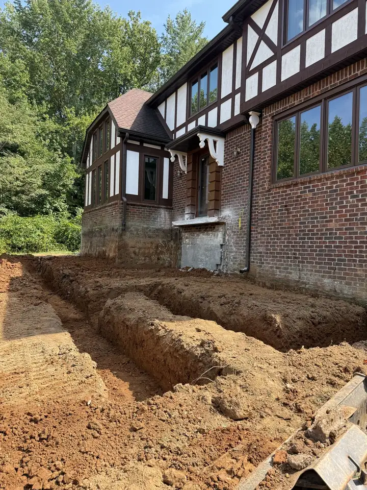 Footer trenches excavated for a new porch build — Hendersonville TN